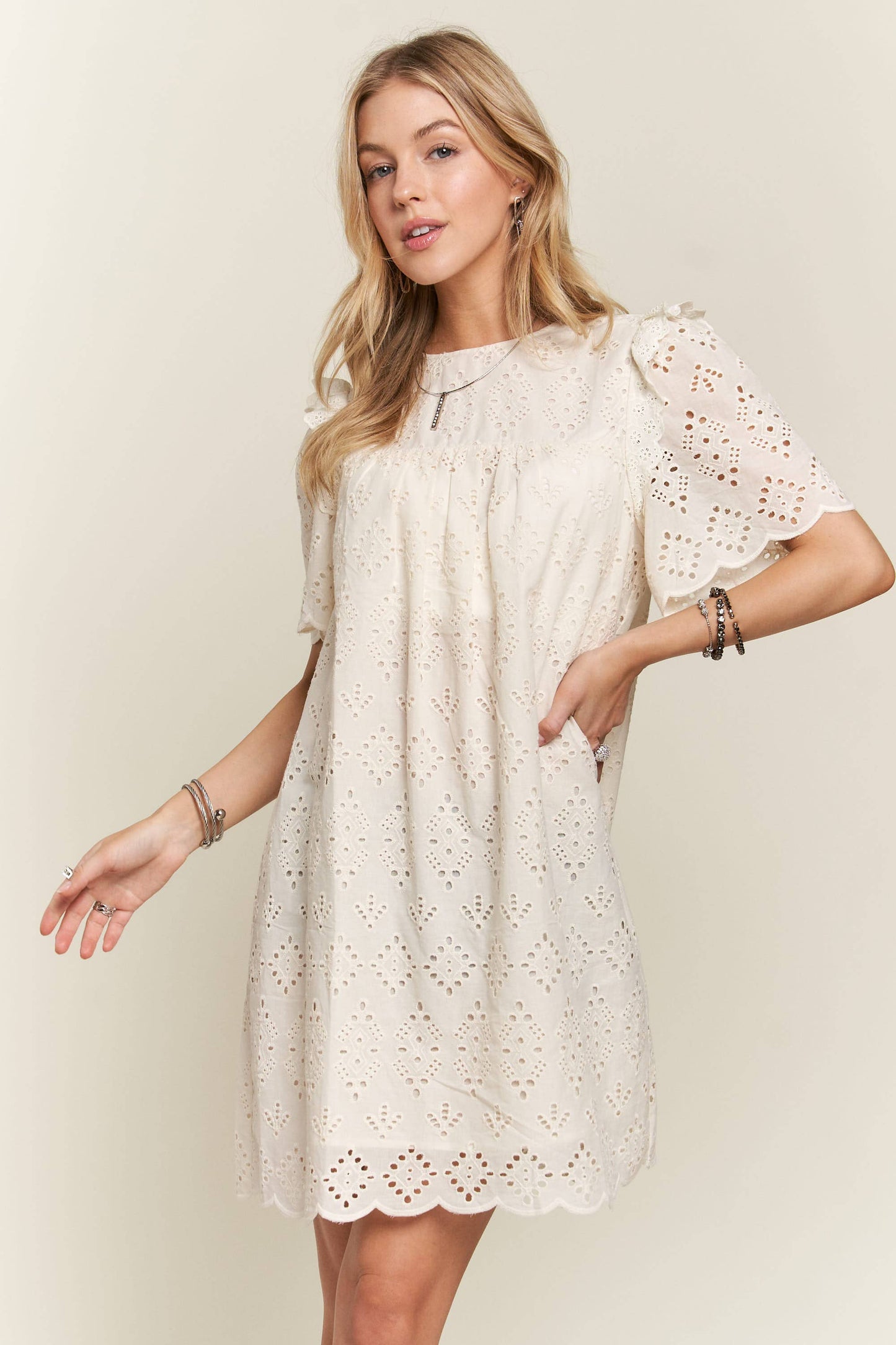 Ruffle shoulder eyelet dress