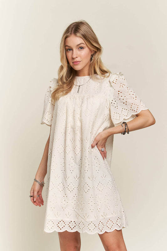 Ruffle shoulder eyelet dress