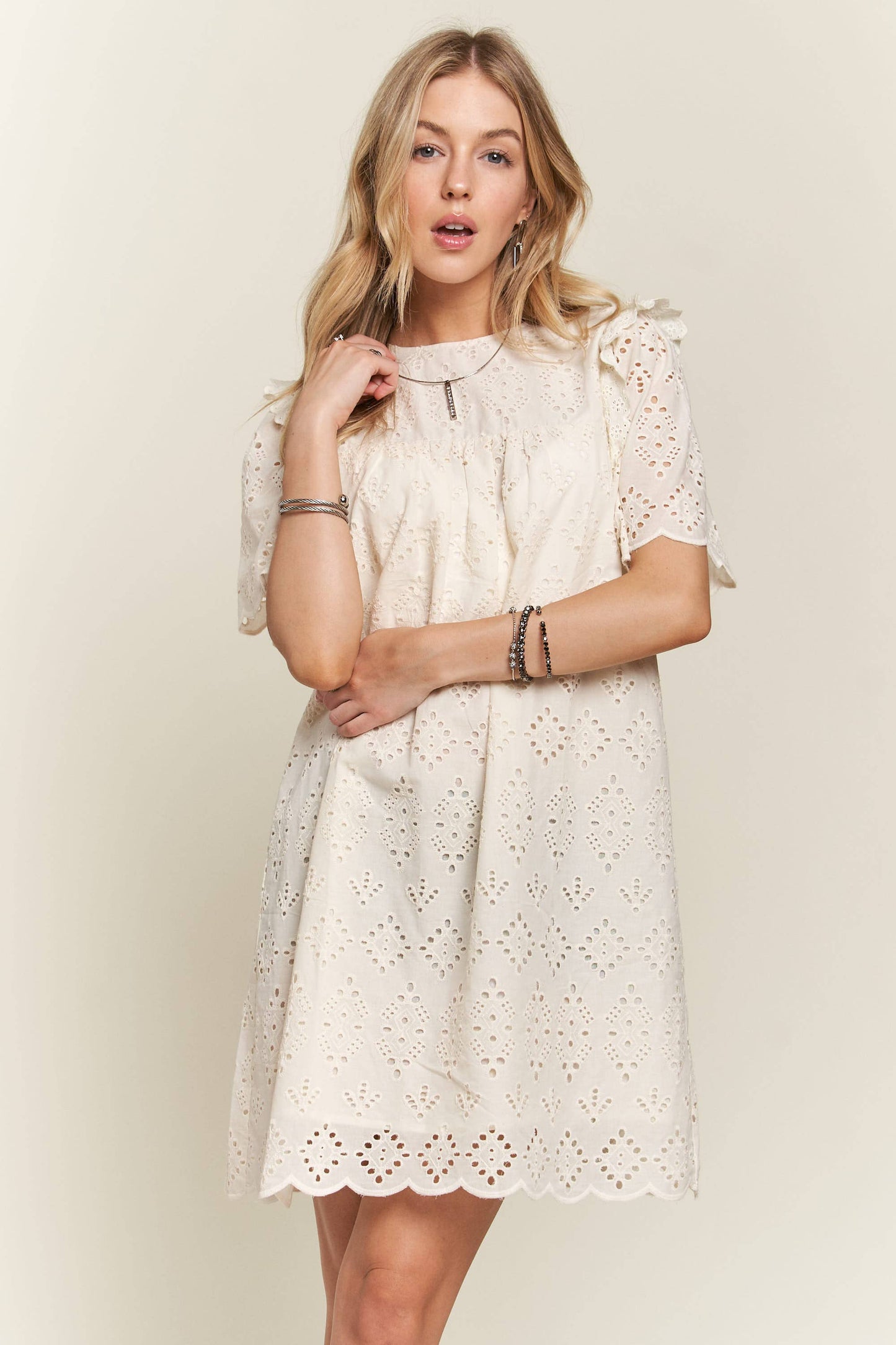 Ruffle shoulder eyelet dress