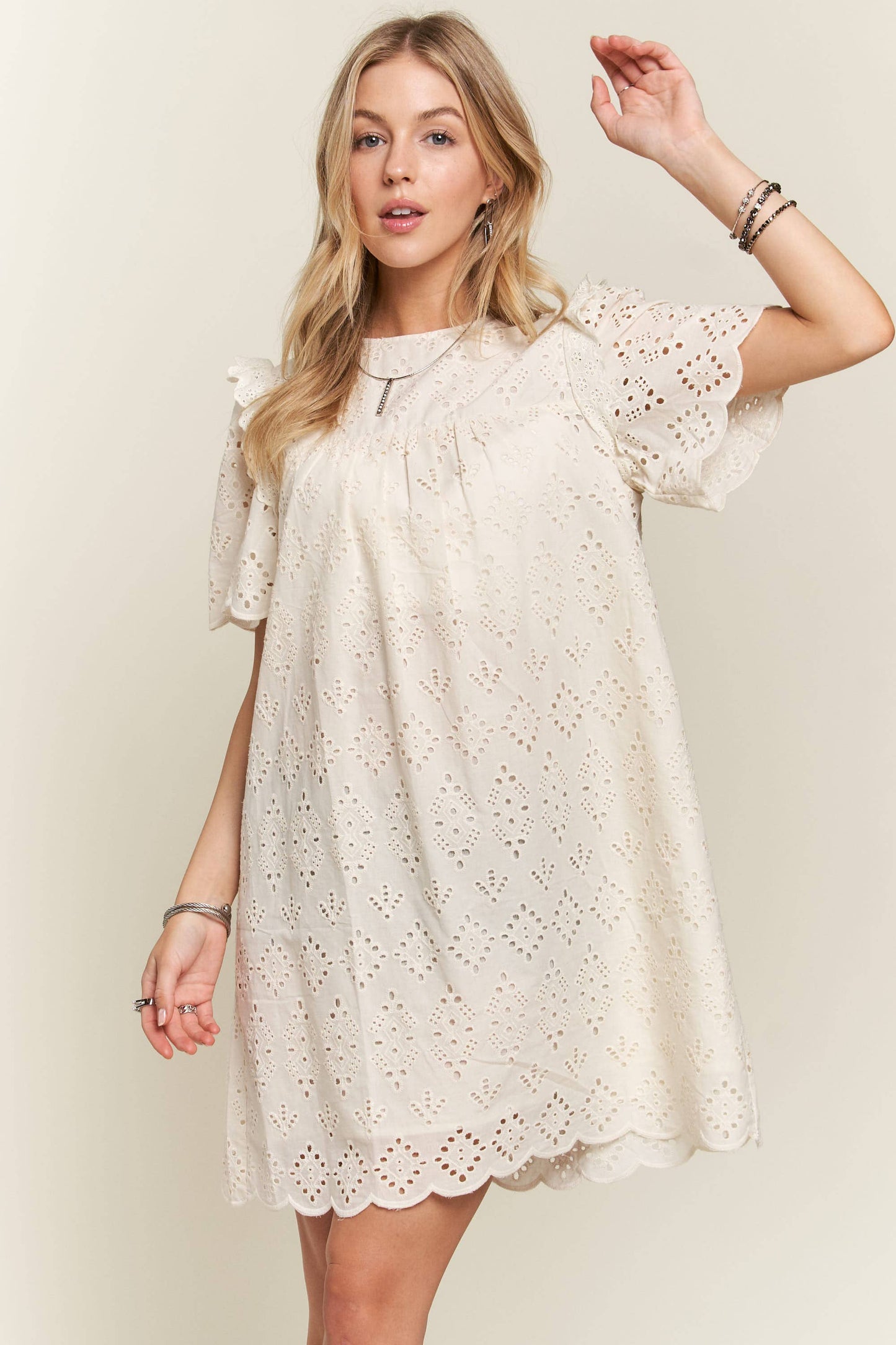 Ruffle shoulder eyelet dress