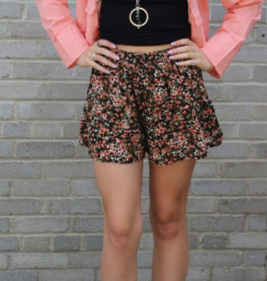 Draping open sleeveless cardigan