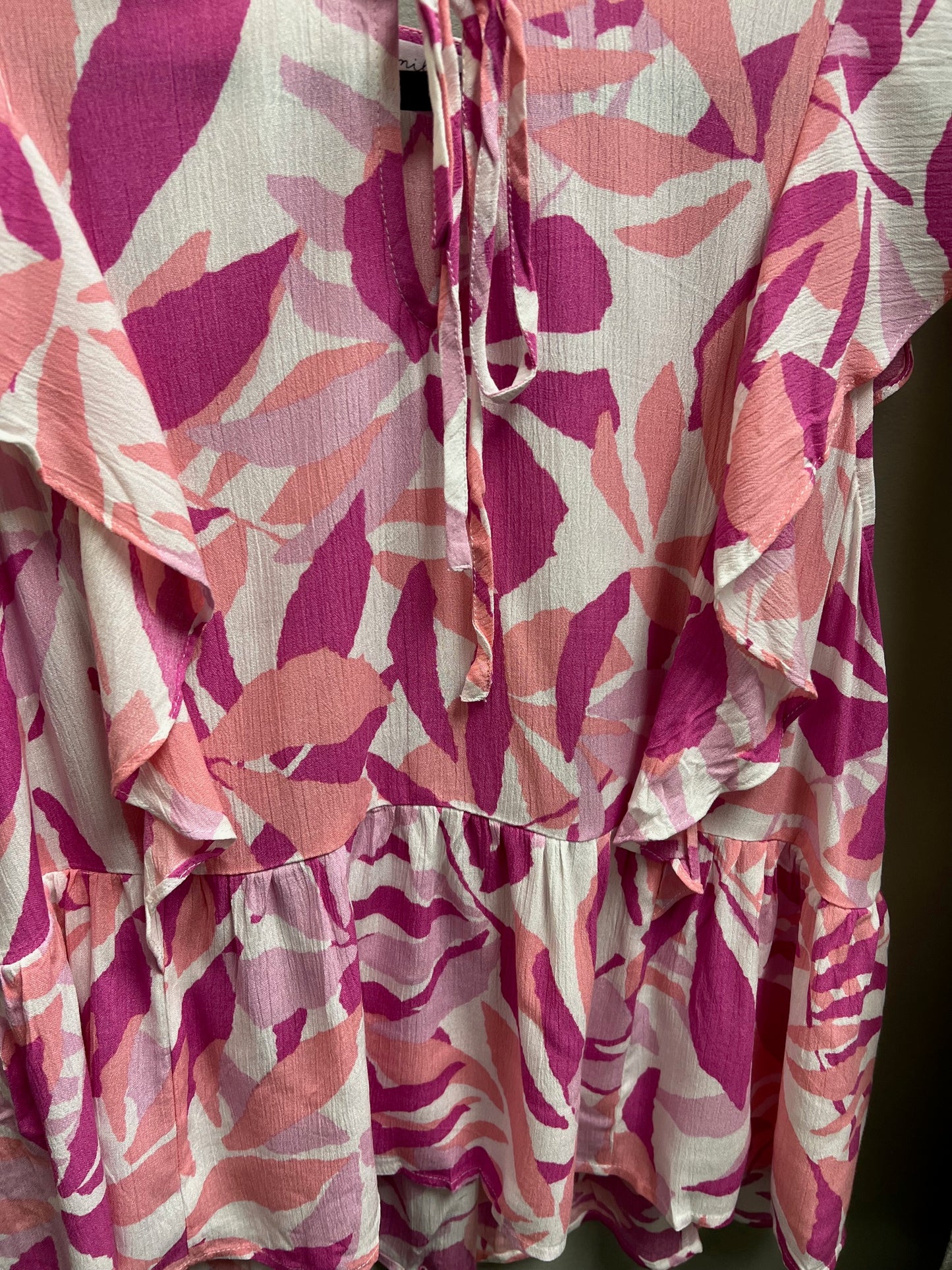 Breezy in pink with ruffle detail top
