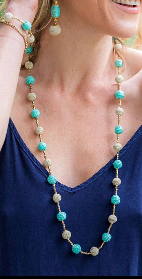 Turquoise water’s long necklace