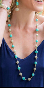 Turquoise water’s long necklace
