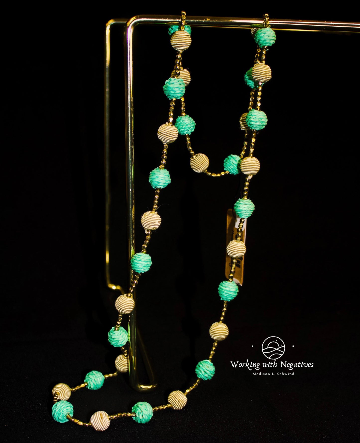 Turquoise water’s long necklace