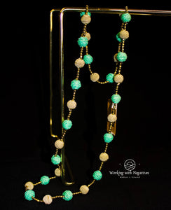 Turquoise water’s long necklace
